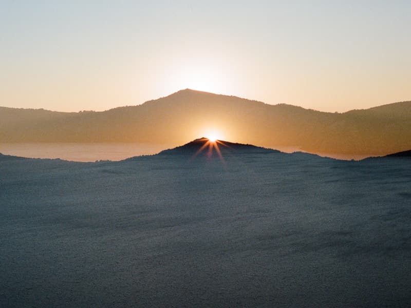Sunset double exposed in Crater Lake National Park, Oregon