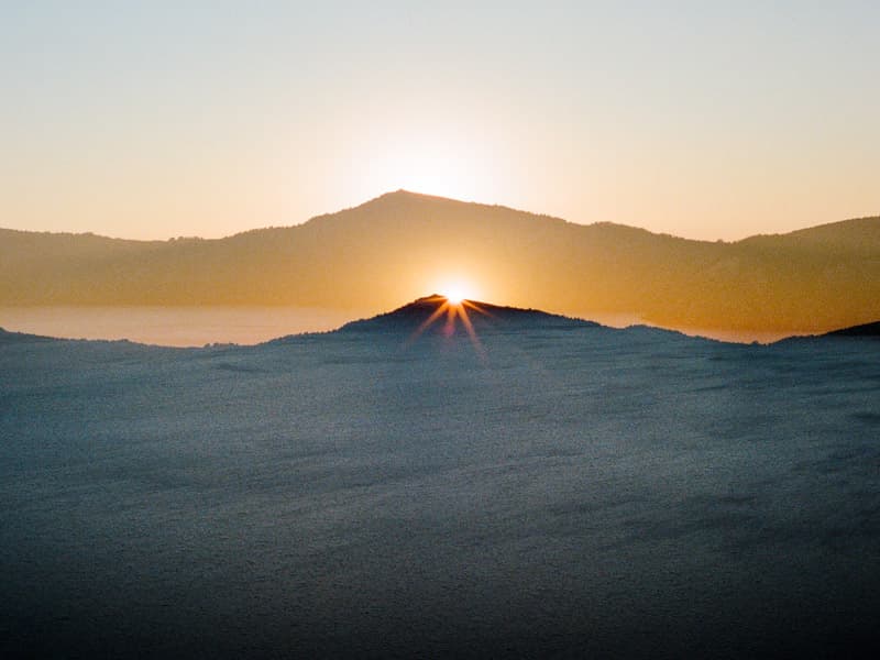 Sunset double exposed in Crater Lake National Park, Oregon