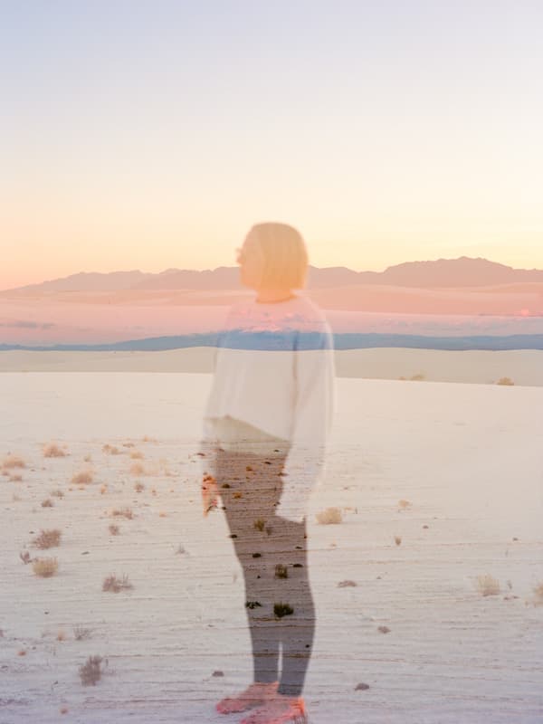 Taylor double exposed with the sunset in White Sands National Park, New Mexico